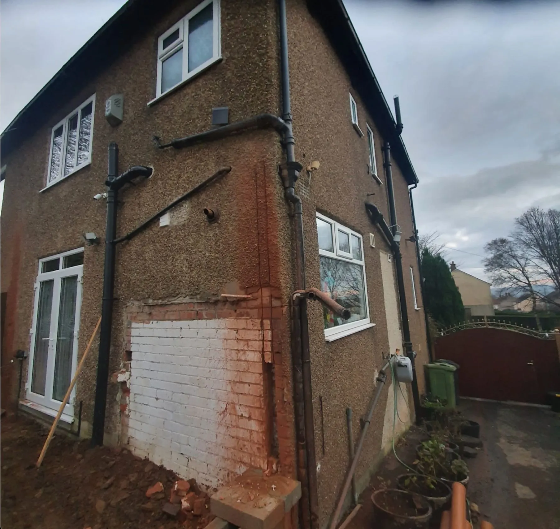 Rear of a brick semi before the extension, Halifax